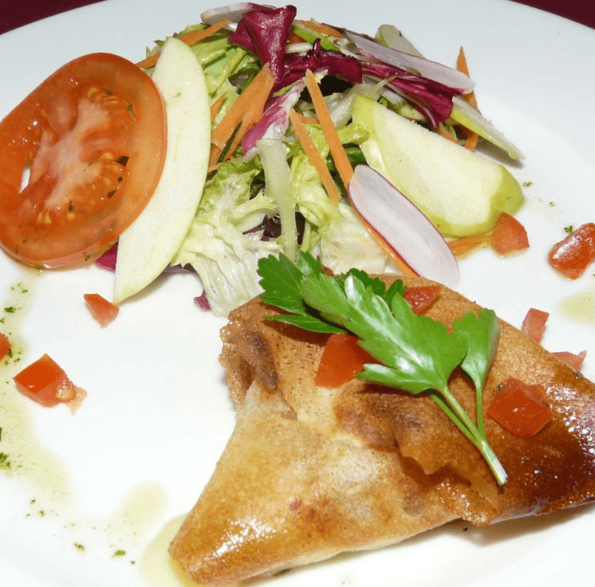 Cruixent de brie amb xampinyons, amanida de poma i magrana del nostre menu executiu